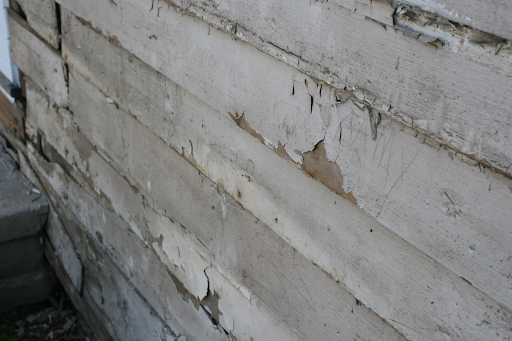 Siding that has begun to chip and crack