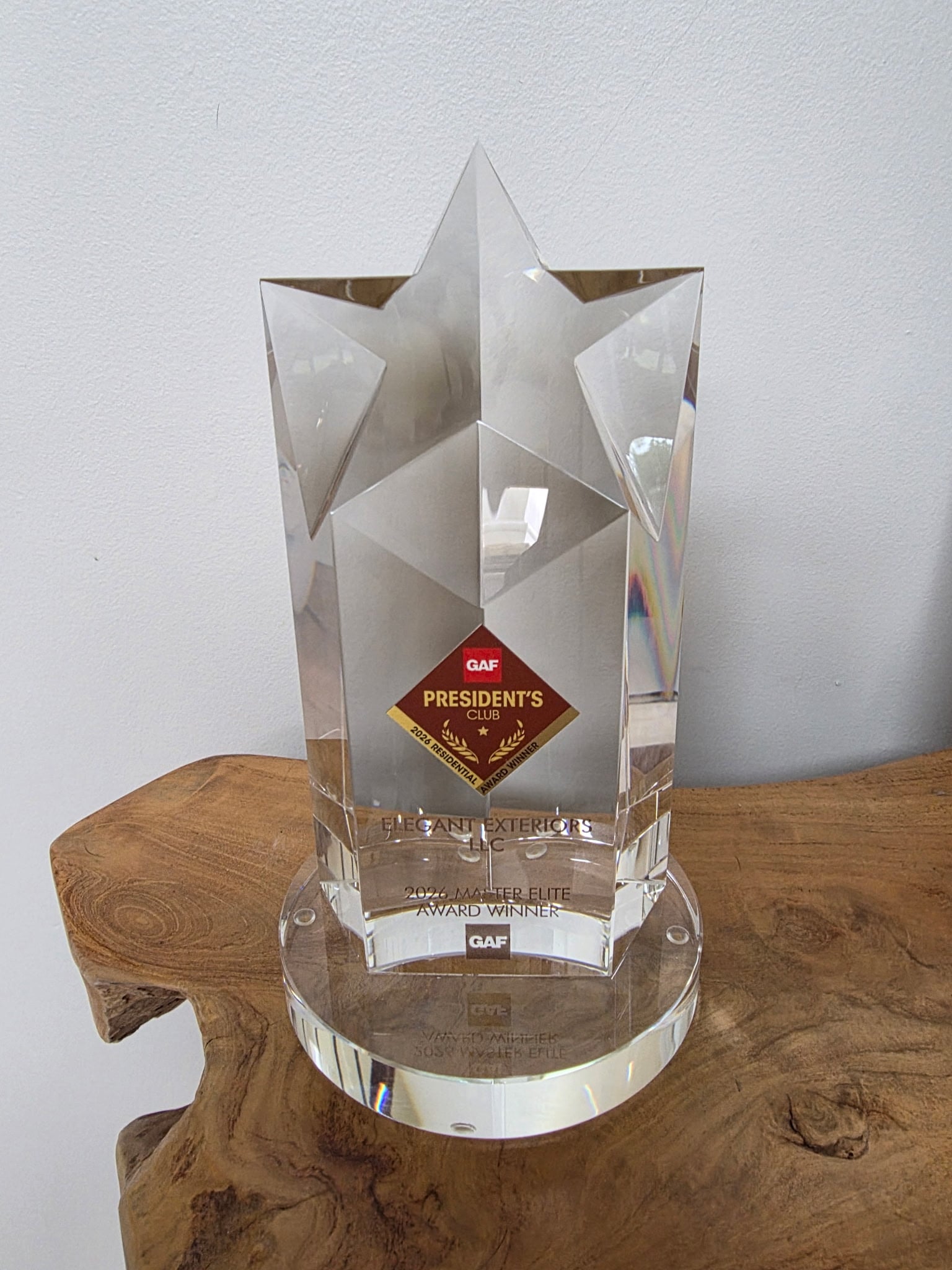 GAF President's Club Award to Elegant Exteriors LLC Roofing, Siding, Windows & Gutters. GAF President's Club award recognition for Elegant Exteriors roofing contractor with completed roof installation in New Jersey